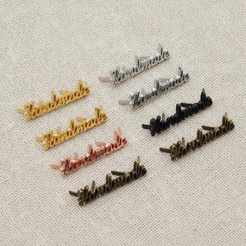 10 قطع من الملصقات المعدنية ال - مراجعة Sewing Label وسعره